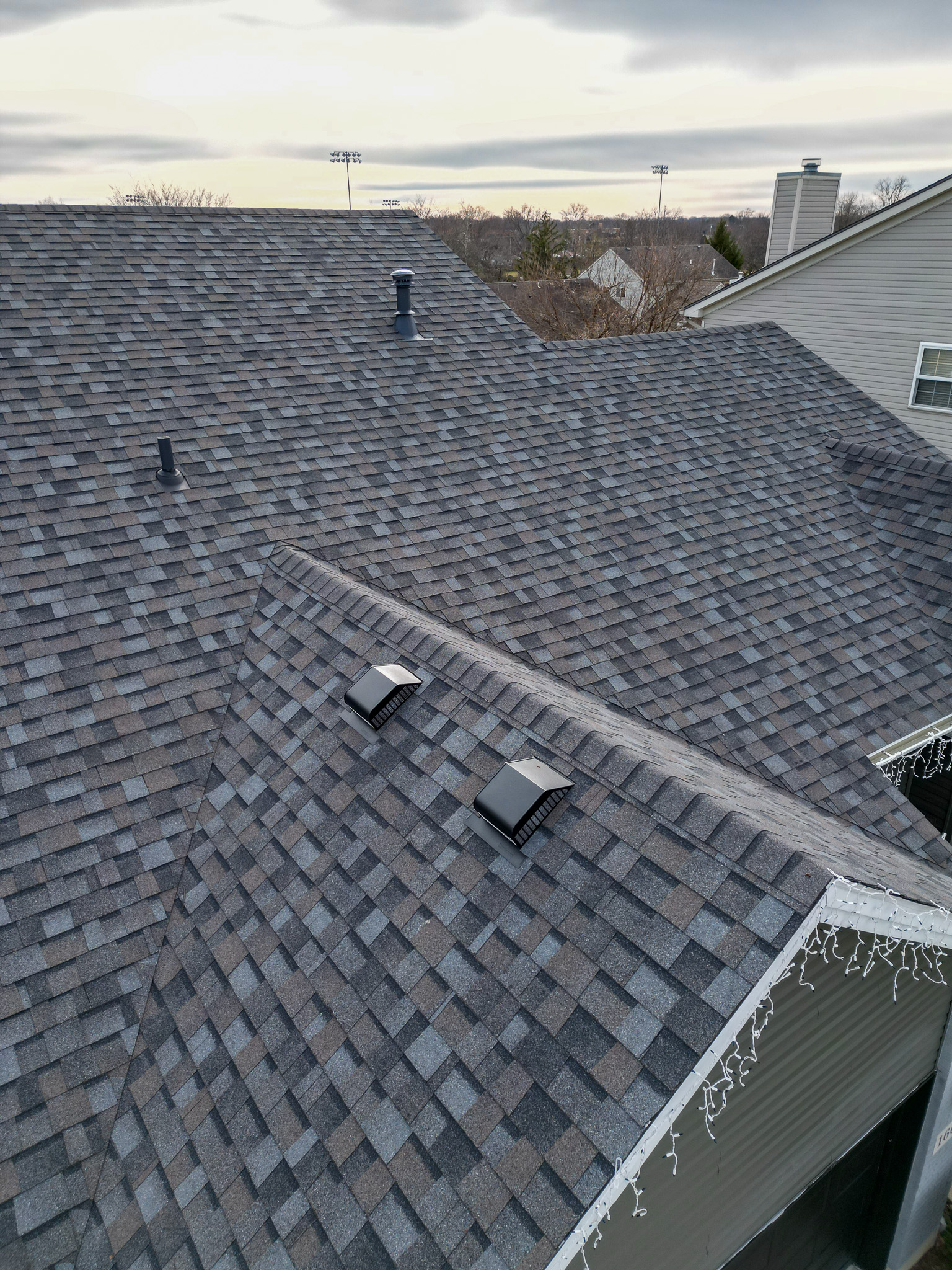 Navigating the Decision: Local vs. National Roofing Contractors